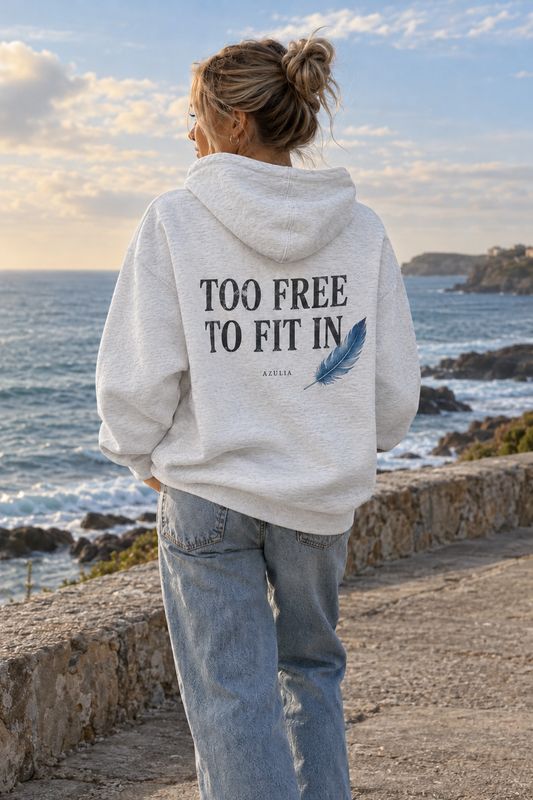 AZULIA Too Free to Fit In — felpa oversize bianco mélange, retro indossato con scritta e piuma azzurra